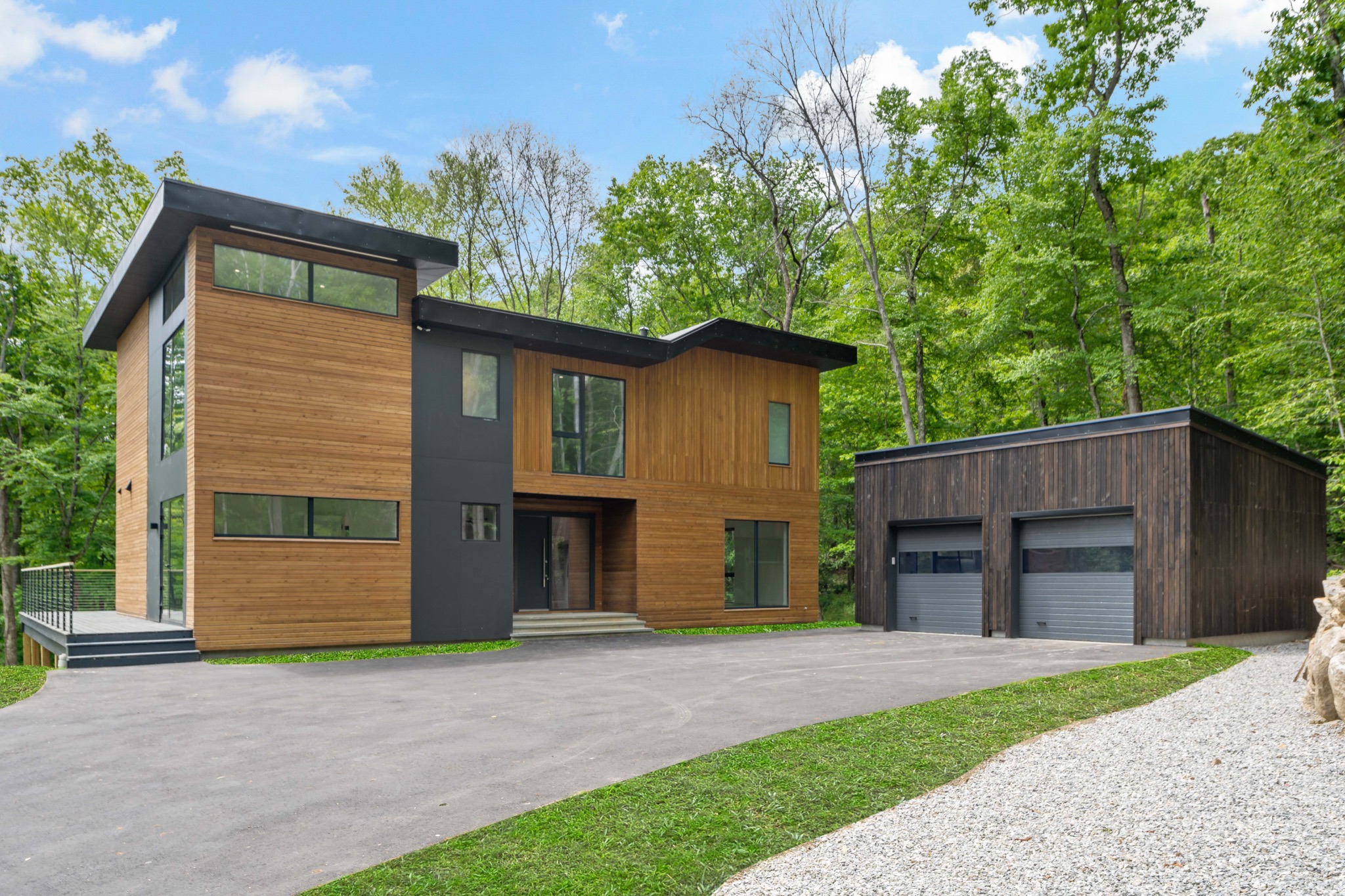Michael's Way, Weston, CT: cedar and charcoal residence on a wooded lot